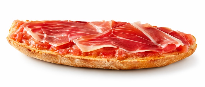 Media Tostada, con tomate triturado y lonchas de jamón serrano